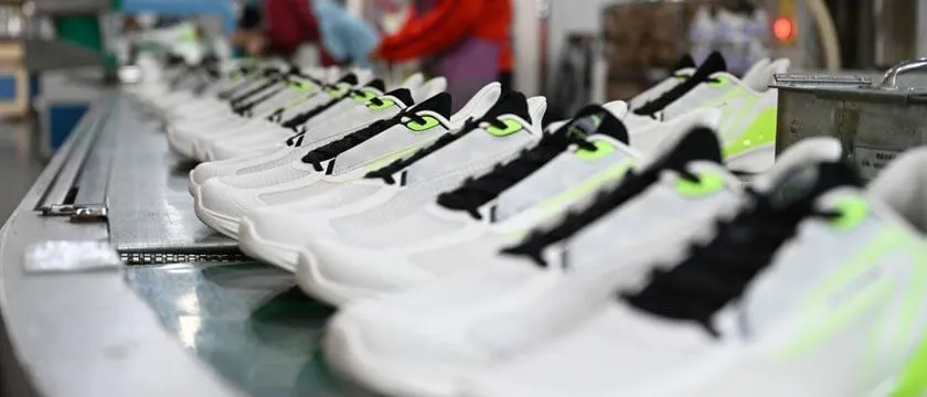 Sports shoe production line with sneaker assembly and sole bonding in Jinjiang, China's sneaker manufacturing capital