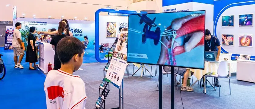 Cleanroom assembly of precision medical devices at a MedTech factory in Suzhou, China